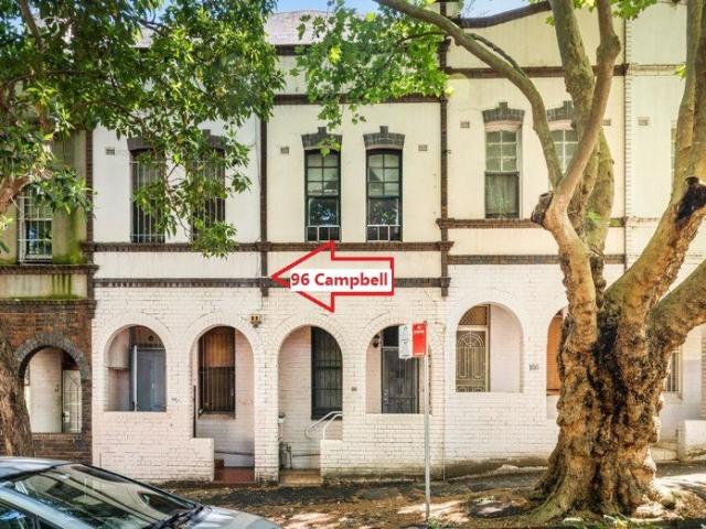 A Sought After Terrace House in Premier City Location Mixed Use High Investment Return