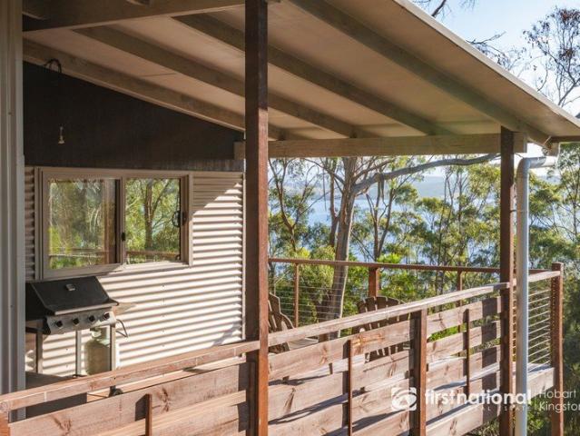 Sustainable Coastal Living with Channel Views & Great Bay at Your Doorstep!