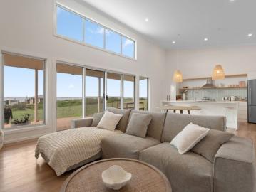 Sustainable coastal living with space, light & serenity