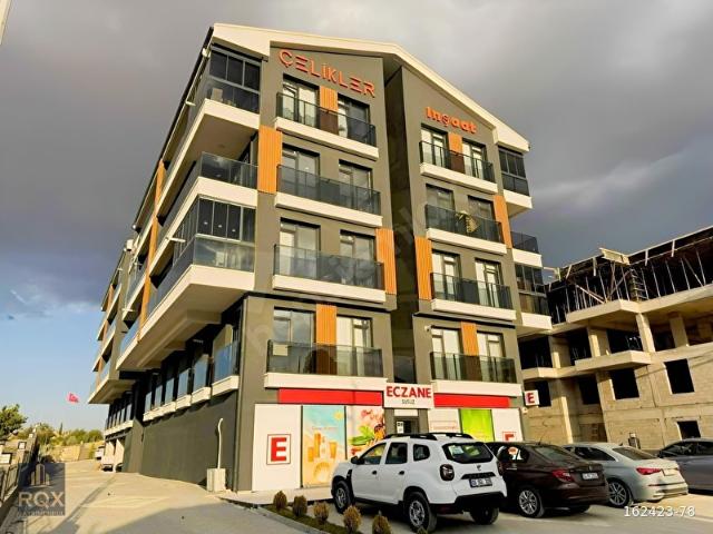 SUSUZ'DA İSTANBUL YOLU CEPHELİ AMERİKAN MUTFAK 2+1 SATILIK DAİRE