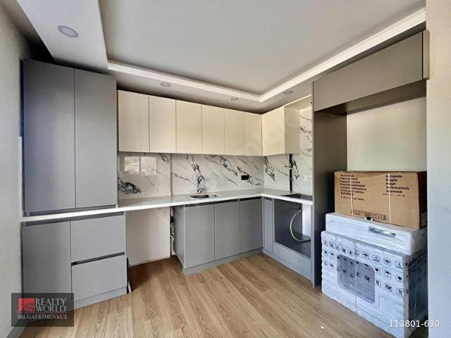 SÜTÇÜLER MAHALLESİNDE CADDE YAKINI DONANIMLI LÜKS 1+1