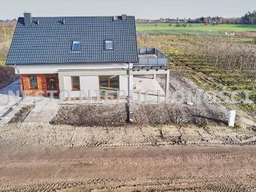 Solidny dom 140 m2 w Szczutkach z tarasem i energooszczędnymi rozwiązaniami