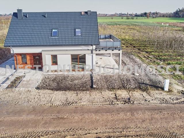 Solidny dom 140 m2 w Szczutkach z tarasem i energooszczędnymi rozwiązaniami